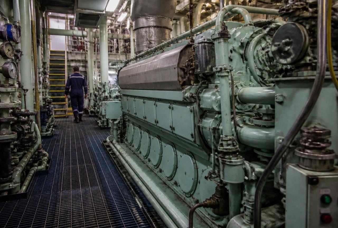 Marine engine room with main engine, pipework and instrumentation